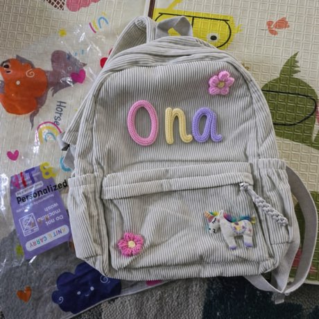 LumiaBag en color vainilla con el nombre Ona tejido